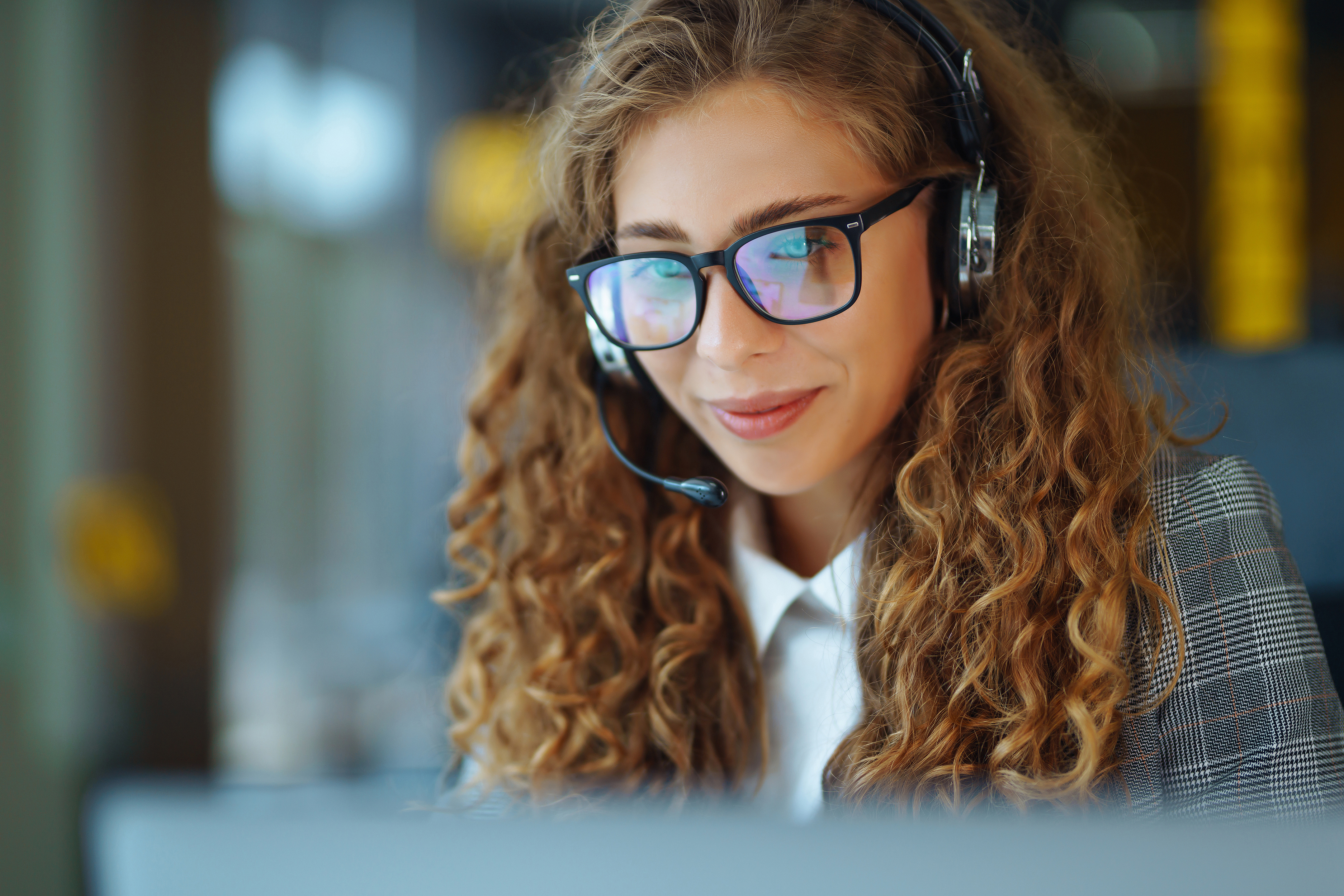 call-center-agent-with-headset-working-on-support-2023-11-27-05-23-58-utc